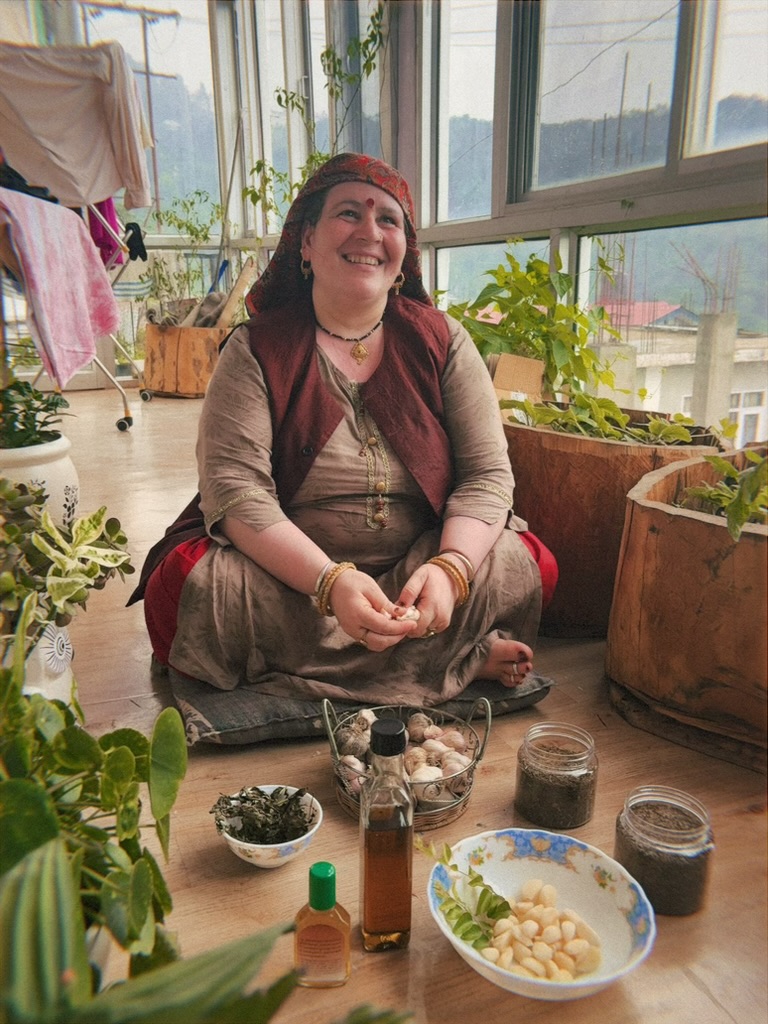 Herbalist with oils and garlic