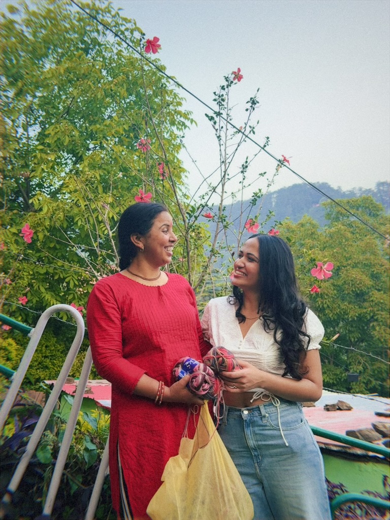 Two women on a hillside terrace